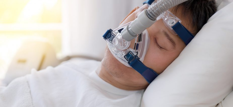 sleeping with a sleep apnea mask on