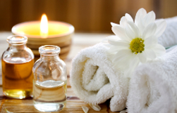 candles, towels and scented oils at a spa